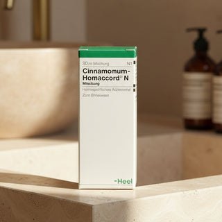 Box of Cinnamomum Homaccord - Drops 30ml medicine, with branding and product information.